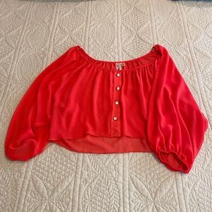Super cute orangish/red crop top blouse.